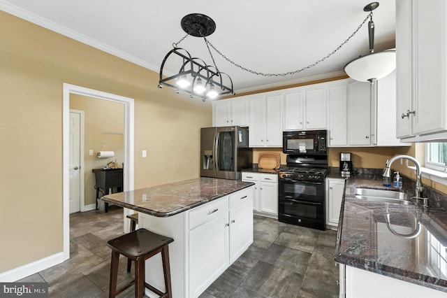 28 White Birch Blvd, Bear, DE 19701 - kitchen featuring black appliances, crown molding, white cabinets, and hanging light fixtures