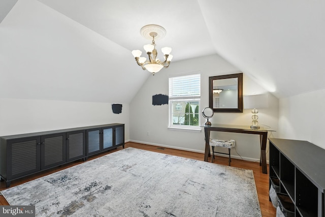 28 White Birch Blvd, Bear, DE 19701 - bonus room with wood finished floors, a chandelier, and lofted ceiling