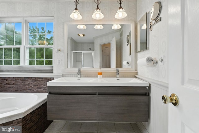 28 White Birch Blvd, Bear, DE 19701 - full bathroom with double vanity, tile patterned floors, a bath, a stall shower, and wallpapered walls