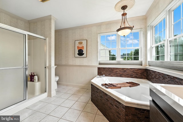 28 White Birch Blvd, Bear, DE 19701 - bathroom featuring tile patterned floors, a shower stall, a bath, wainscoting, and wallpapered walls