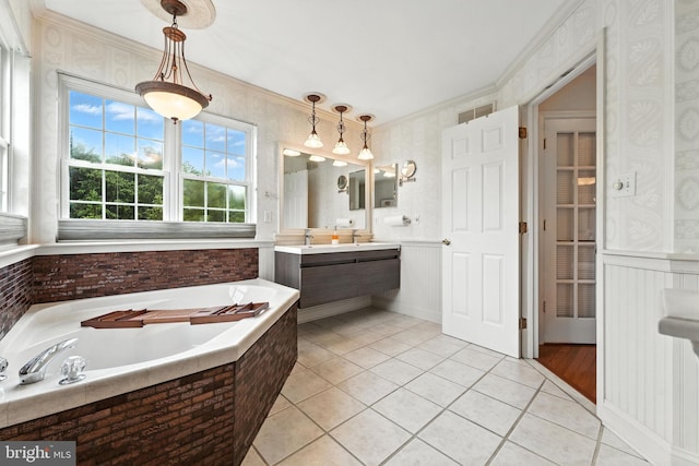 28 White Birch Blvd, Bear, DE 19701 - full bathroom featuring vanity, a garden tub, tile patterned floors, a wainscoted wall, and crown molding