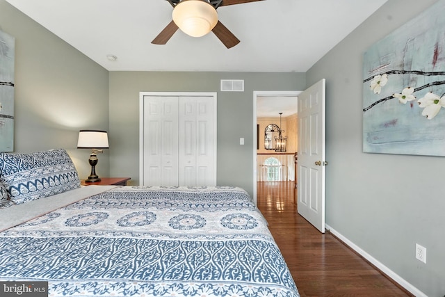 28 White Birch Blvd, Bear, DE 19701 - bedroom featuring wood finished floors, a closet, a chandelier, and ceiling fan