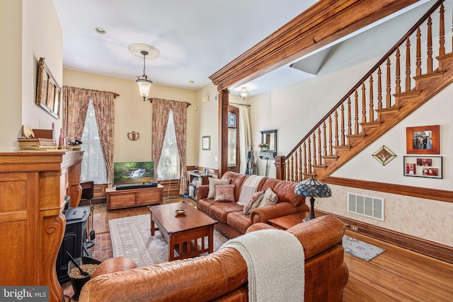 125 N Hanover St, Pottstown, PA 19464 - living area featuring wood finished floors and stairway