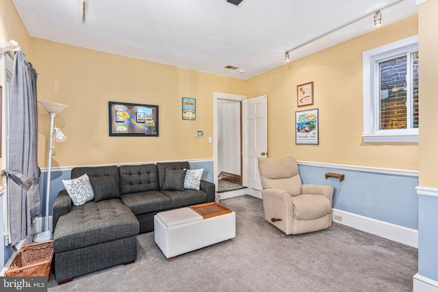 125 N Hanover St, Pottstown, PA 19464 - living area with track lighting and carpet flooring