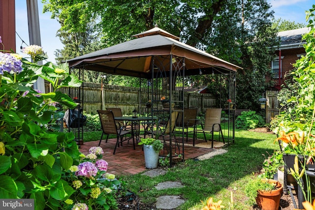 125 N Hanover St, Pottstown, PA 19464 - fenced backyard with a gazebo and a patio