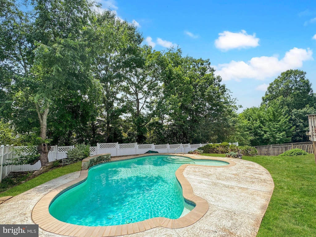 9659 Allegro Dr, Manassas, VA 20112 - view of pool with a fenced backyard, a patio area, and view of wooded area