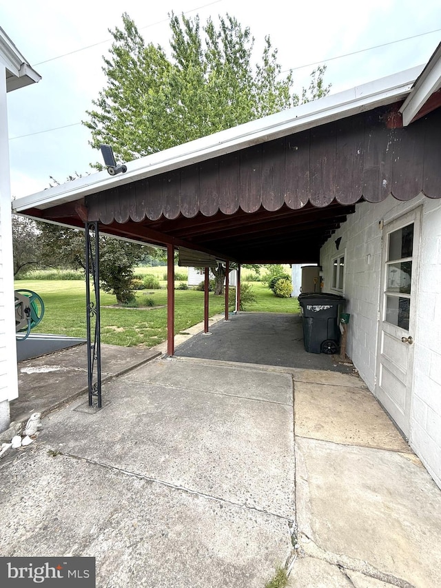 619 Penn Dr, Tamaqua, PA 18252 - view of parking / parking lot with an attached carport and concrete driveway