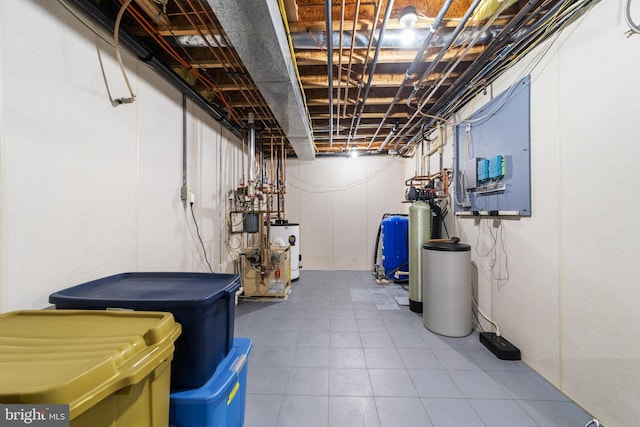 336 Lincoln Rd, Pilesgrove, NJ 08098 - unfinished basement with a water pressure tank, a water softener system, and tile patterned floors