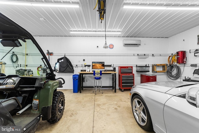 336 Lincoln Rd, Pilesgrove, NJ 08098 - garage featuring a wall mounted AC
