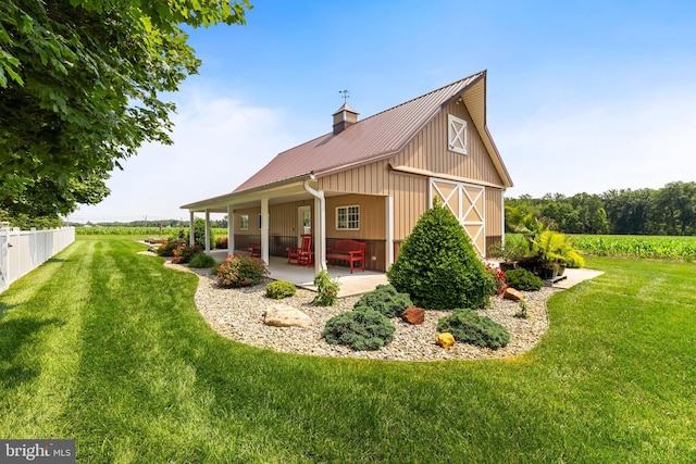 336 Lincoln Rd, Pilesgrove, NJ 08098 - view of home's exterior with a barn, a metal roof, and an outbuilding