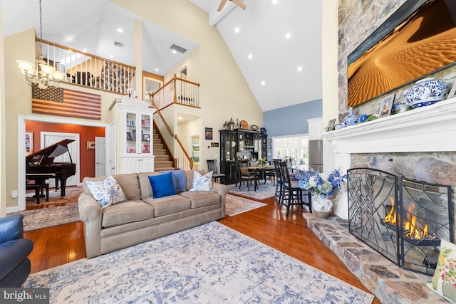 336 Lincoln Rd, Pilesgrove, NJ 08098 - living area featuring high vaulted ceiling, wood finished floors, stairs, a chandelier, and recessed lighting