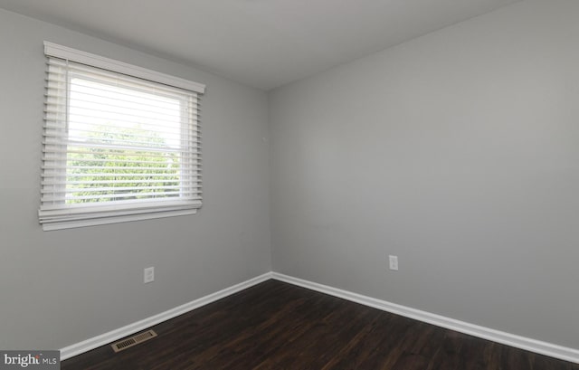 754 Second St, Woodbury Heights, NJ 08097 - empty room with dark wood finished floors and baseboards