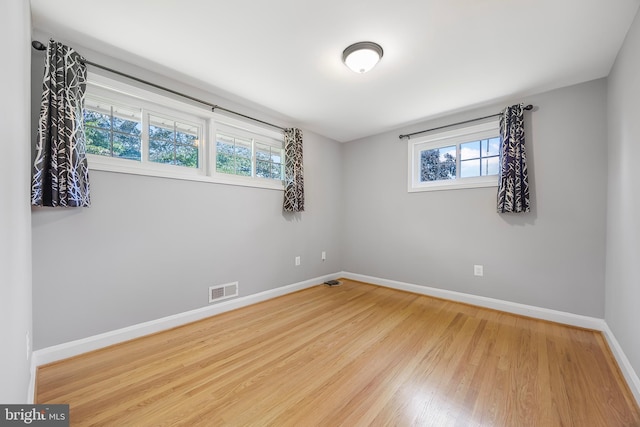 1305 Heather Hill Rd, Baltimore, MD 21239 - spare room with baseboards and wood finished floors