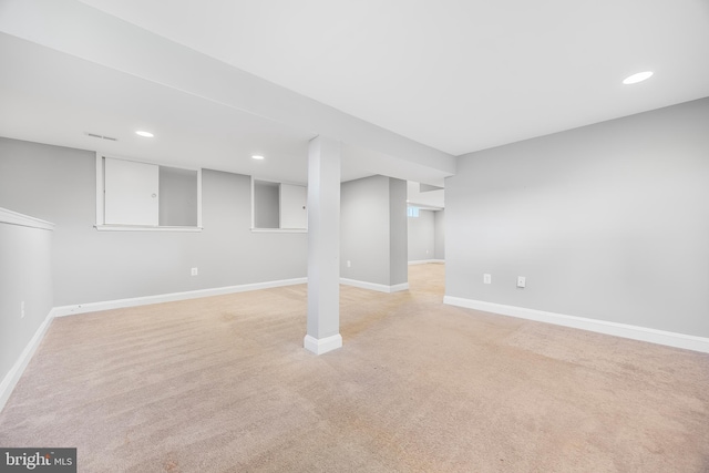 1305 Heather Hill Rd, Baltimore, MD 21239 - finished below grade area with light colored carpet and recessed lighting