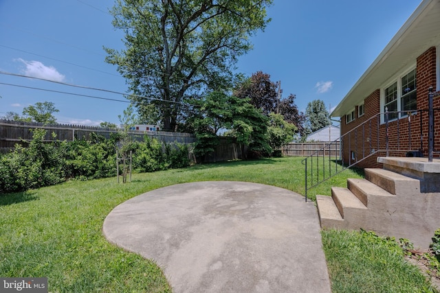 1305 Heather Hill Rd, Baltimore, MD 21239 - fenced backyard with a patio area