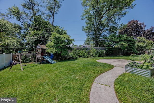 1305 Heather Hill Rd, Baltimore, MD 21239 - fenced backyard with a playground