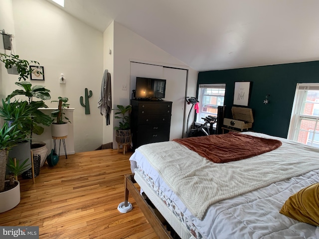 316-322 W Wildey St, Philadelphia, PA 19123 - bedroom with vaulted ceiling, light wood-type flooring, multiple windows, and a closet