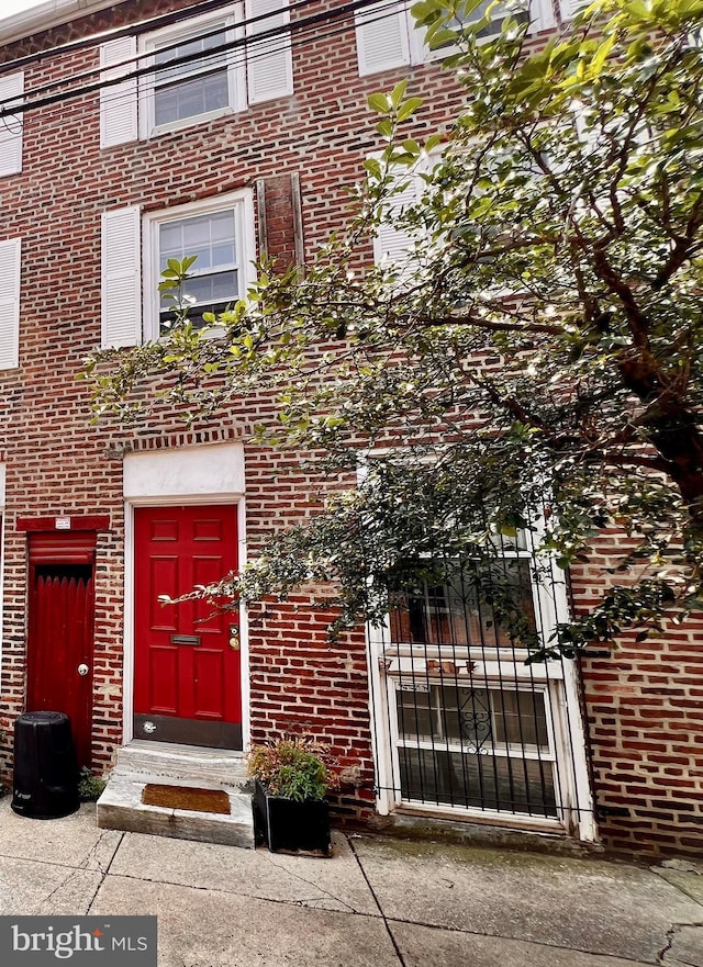 316-322 W Wildey St, Philadelphia, PA 19123 - doorway to property featuring brick siding