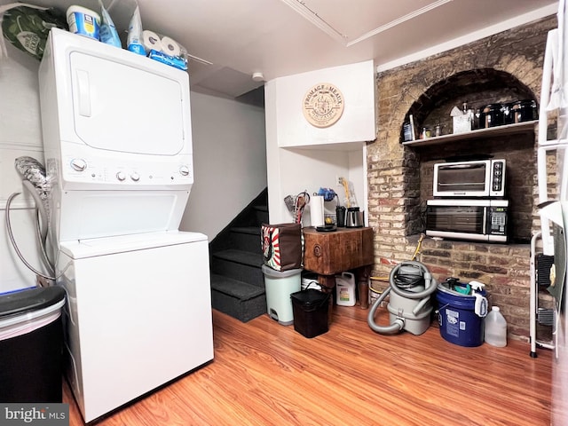 316-322 W Wildey St, Philadelphia, PA 19123 - laundry room with stacked washer / drying machine, wood finished floors, and attic access