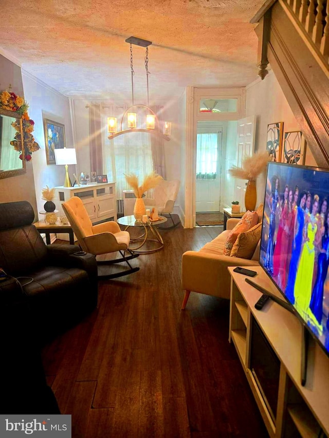 458 W Oley St, Reading, PA 19601 - living area with a textured ceiling and wood finished floors