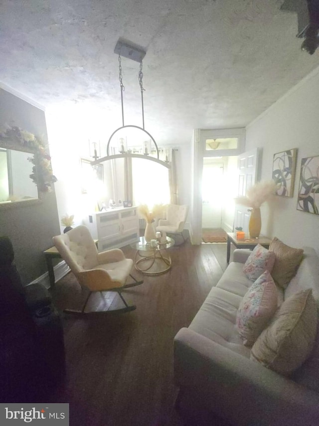 458 W Oley St, Reading, PA 19601 - living room with wood finished floors and a chandelier