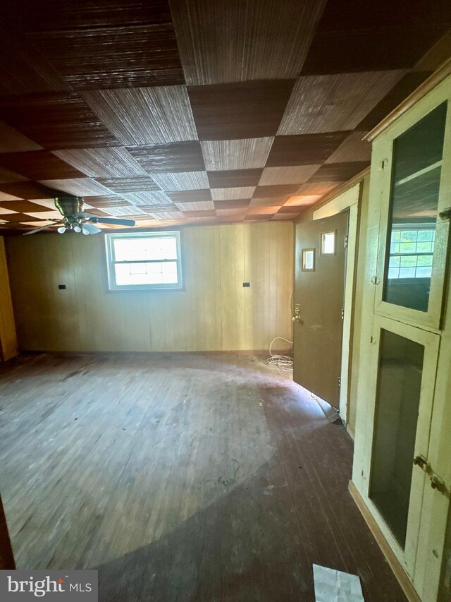 219 E Pike St, Bellefonte, PA 16823 - below grade area featuring hardwood / wood-style flooring and wood walls