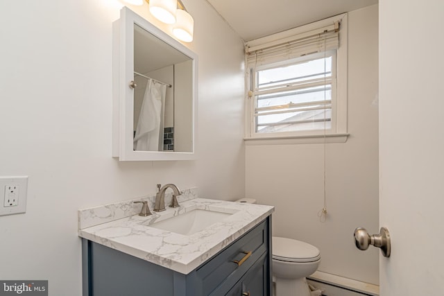 1916 Porter Ave, Suitland, MD 20746 - bathroom with a baseboard radiator, vanity, and a shower with shower curtain