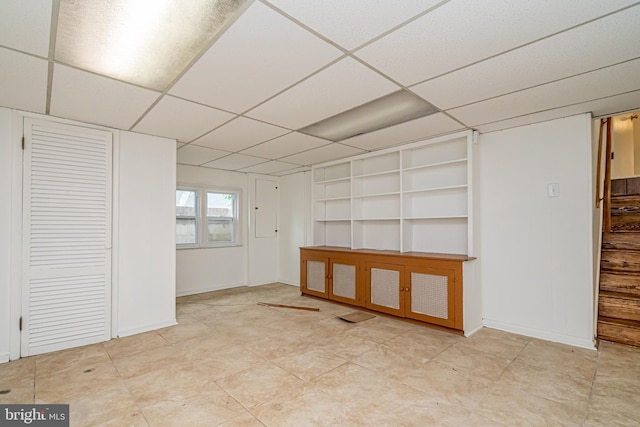 1916 Porter Ave, Suitland, MD 20746 - spare room with built in shelves and a drop ceiling