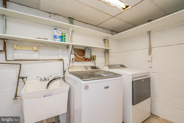 1916 Porter Ave, Suitland, MD 20746 - laundry area featuring independent washer and dryer and concrete block wall