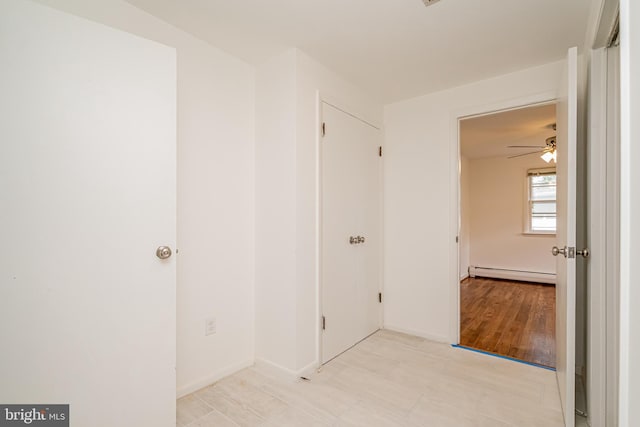 1916 Porter Ave, Suitland, MD 20746 - spare room featuring baseboard heating and a ceiling fan