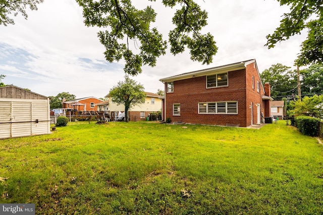1916 Porter Ave, Suitland, MD 20746 - rear view of house featuring brick siding and an outbuilding