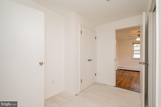 1916 Porter Ave, Suitland, MD 20746 - spare room featuring a baseboard heating unit and ceiling fan
