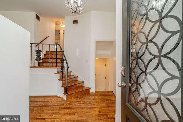 1916 Porter Ave, Suitland, MD 20746 - entrance foyer featuring stairs, wood finished floors, and a chandelier