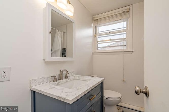1916 Porter Ave, Suitland, MD 20746 - bathroom with vanity and a baseboard heating unit