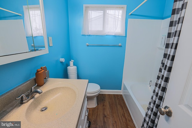 8935 Twin Ridge Dr, Glen Burnie, MD 21061 - full bath featuring plenty of natural light, vanity, wood finished floors, and shower / bath combination with curtain