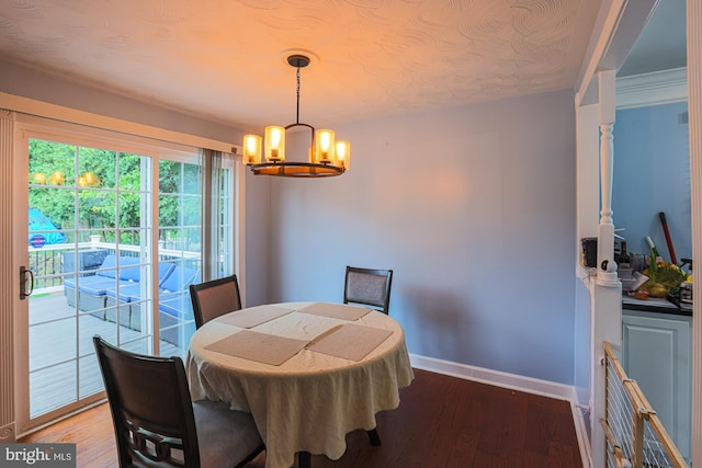 8935 Twin Ridge Dr, Glen Burnie, MD 21061 - dining space with a chandelier and wood finished floors