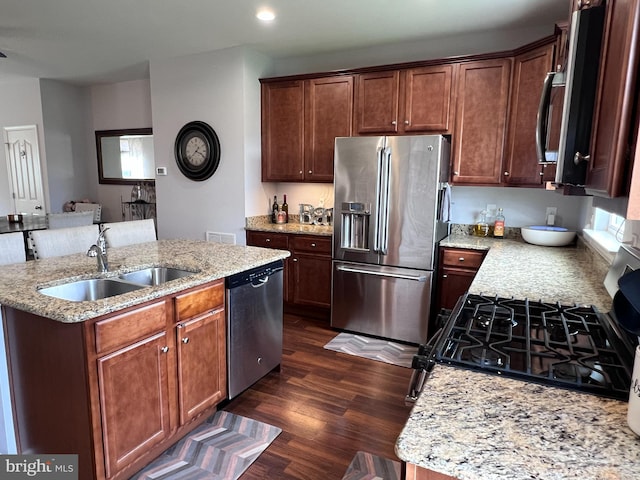 108 Creekside Way, Burlington, NJ 08016 - kitchen with stainless steel appliances, a kitchen island with sink, dark wood-style floors, light stone countertops, and recessed lighting