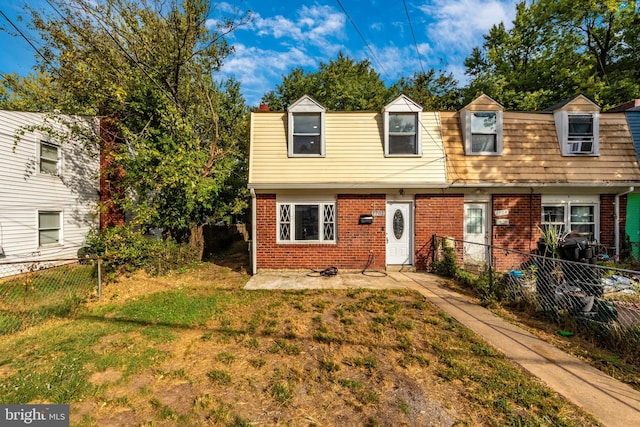 7702 Burnside Rd, Landover, MD 20785 - view of property with brick siding, a fenced backyard, and a chimney