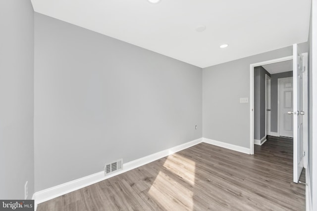 7702 Burnside Rd, Landover, MD 20785 - unfurnished room featuring wood finished floors and recessed lighting