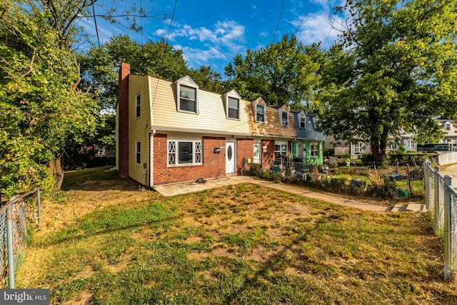 7702 Burnside Rd, Landover, MD 20785 - view of front of home featuring brick siding and a chimney