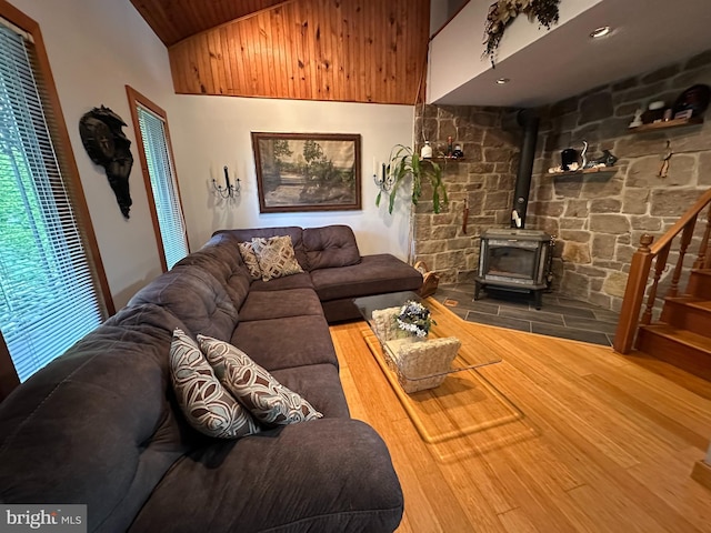 607 Cembra Ct, Feasterville Trevose, PA 19053 - living area with a wood stove, lofted ceiling, wooden ceiling, wood finished floors, and healthy amount of natural light