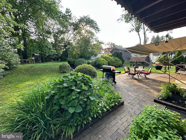 607 Cembra Ct, Feasterville Trevose, PA 19053 - view of patio / terrace with outdoor dining area, a playground, and a grill