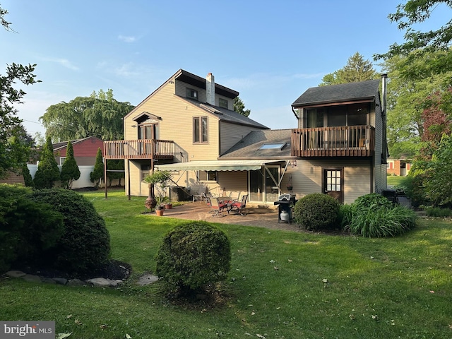607 Cembra Ct, Feasterville Trevose, PA 19053 - rear view of property featuring a patio area, a yard, a chimney, a sunroom, and a shingled roof