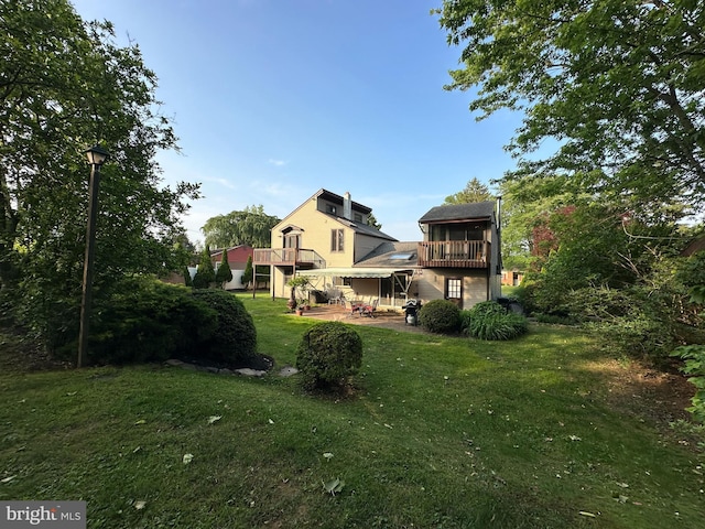607 Cembra Ct, Feasterville Trevose, PA 19053 - rear view of house with a deck, a yard, and a patio area