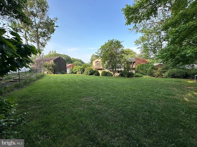 607 Cembra Ct, Feasterville Trevose, PA 19053 - view of grassy yard with a storage shed