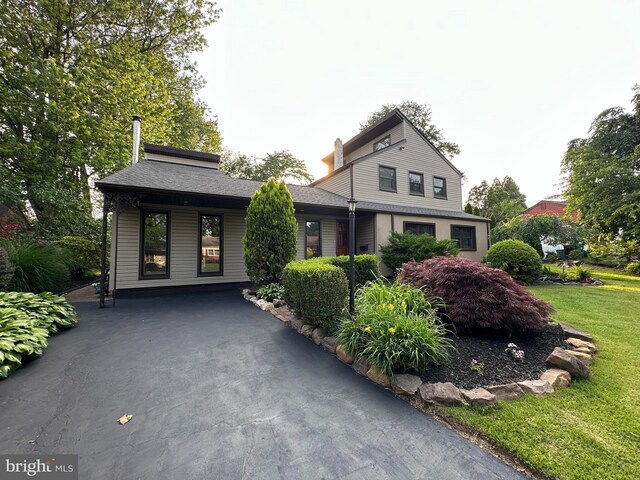 607 Cembra Ct, Feasterville Trevose, PA 19053 - view of front of home with a front lawn and a chimney