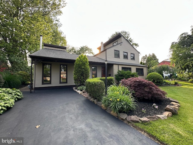 607 Cembra Ct, Feasterville Trevose, PA 19053 - view of front of home with a front lawn and a chimney