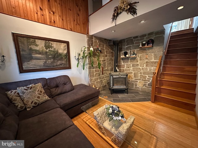 607 Cembra Ct, Feasterville Trevose, PA 19053 - living room featuring stairway, a wood stove, and wood finished floors