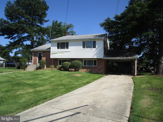 5606 Devon Ct, Temple Hills, MD 20748 - tri-level home featuring brick siding, driveway, a front yard, and an attached carport