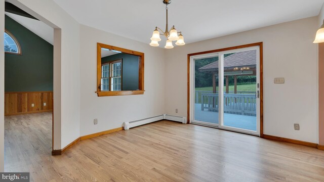 132 Sycamore Dr, Palmerton, PA 18071 - spare room with wood finished floors, a chandelier, and baseboard heating